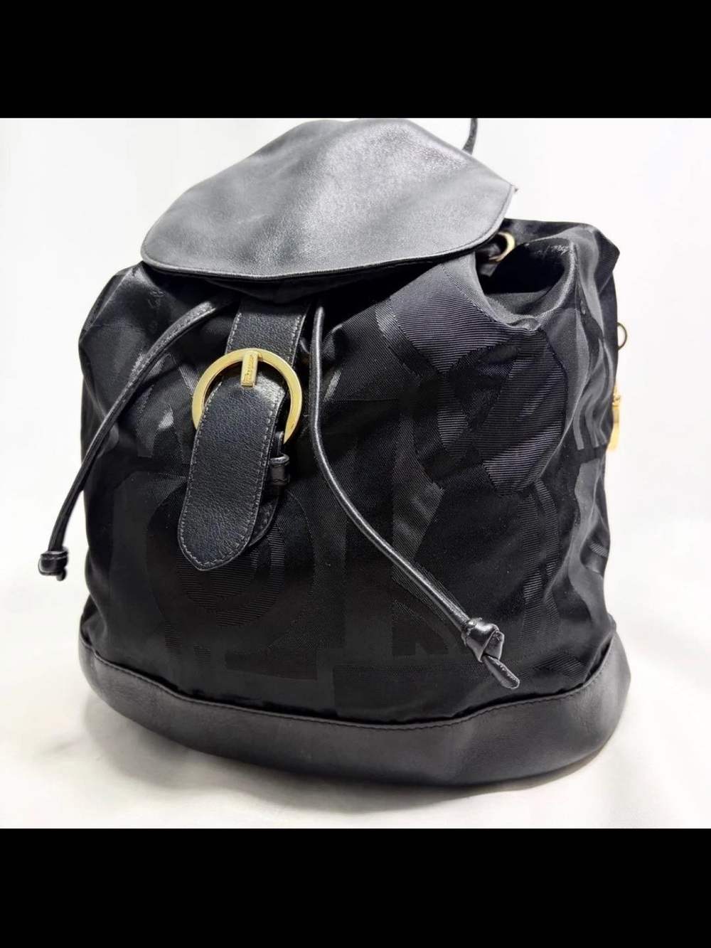 Salvatore Ferragamo Black Drawstring Backpack with Gold Buckle Accent